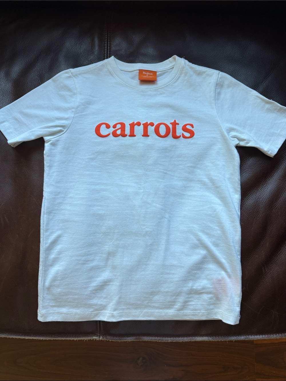 Kids White Short Sleeve Tee with Orange Logo